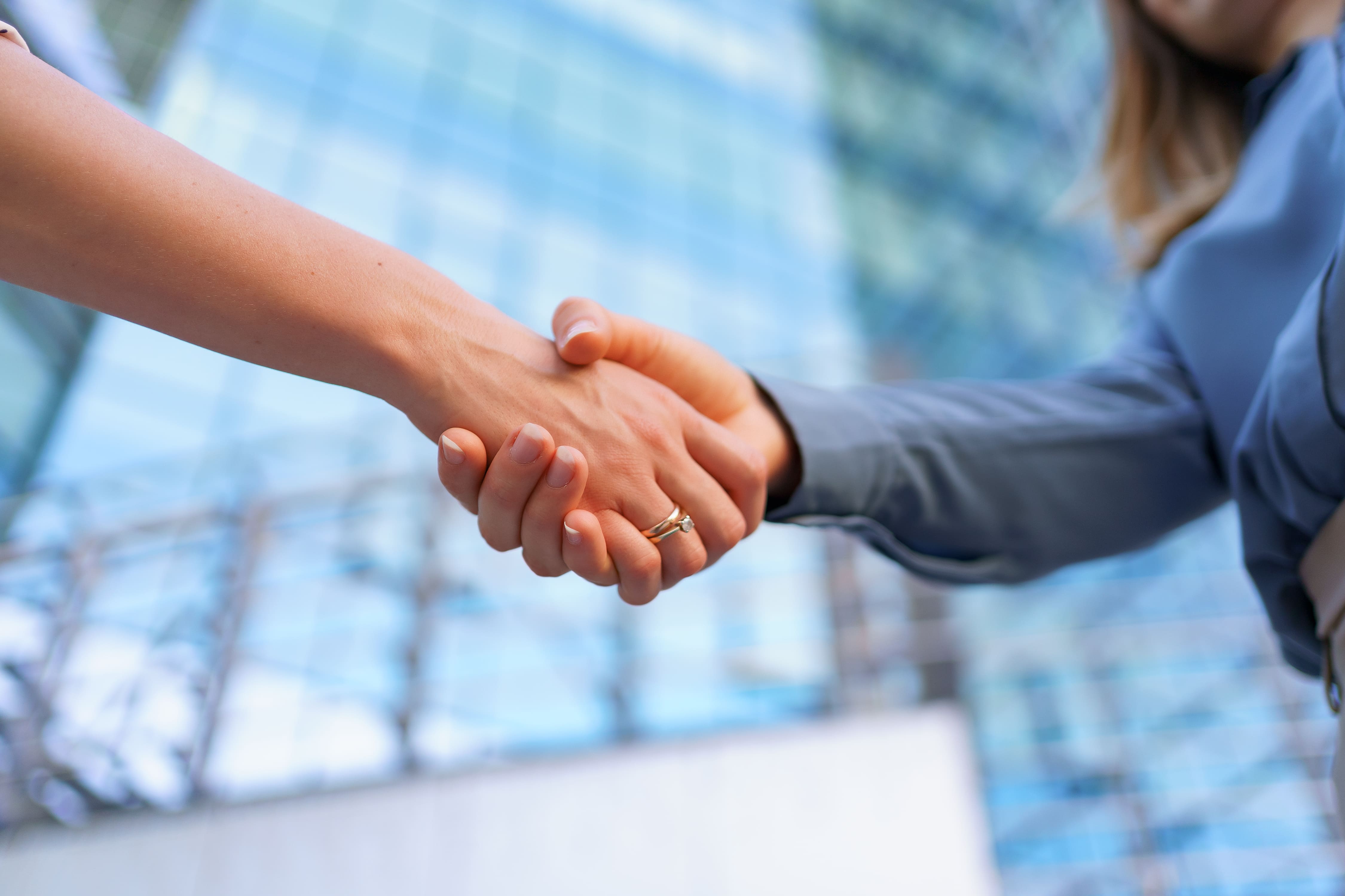 woman-handshaking